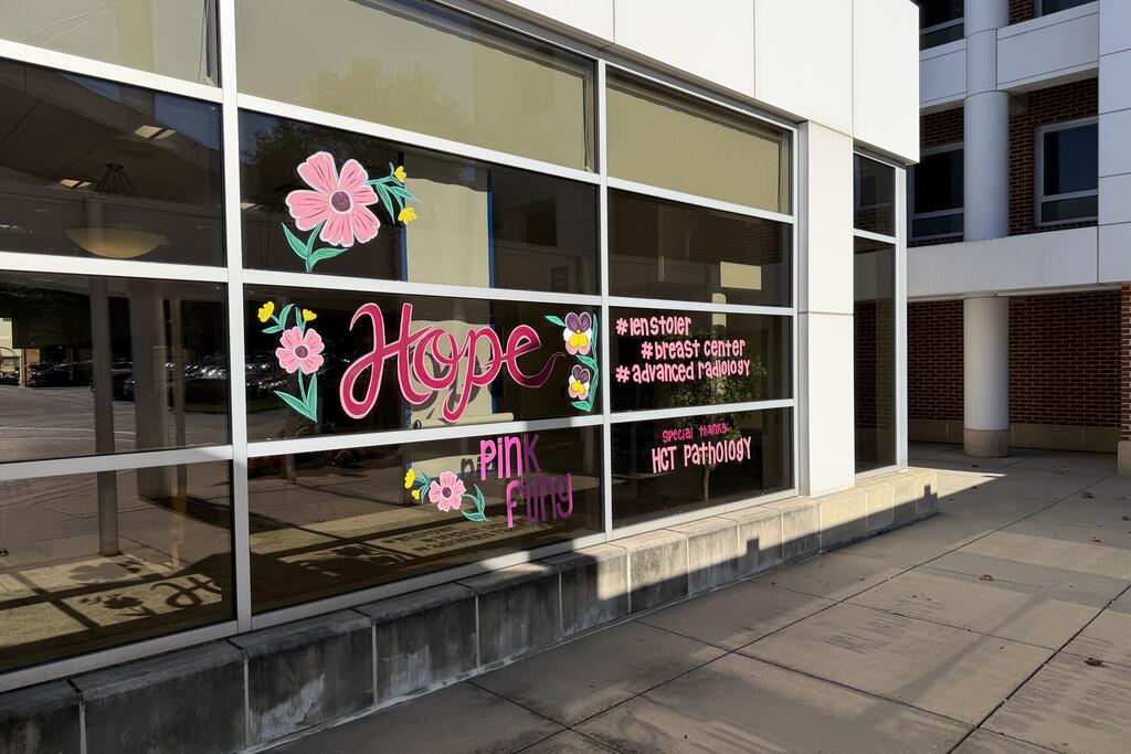 "Pink Fling" window art featuring the word "Hope."