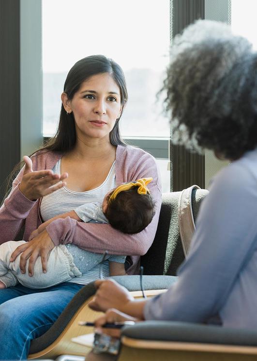 Women with her baby at a post-partum support group