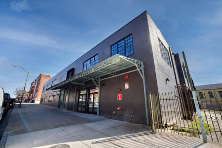 Exterior shot of The Factory building in historic West Baltimore Street.