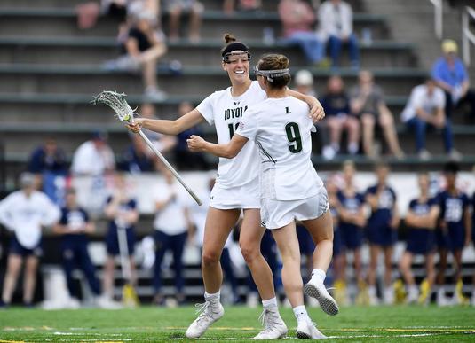 Two Loyola Women's Lacrosse players celebrating their healed rotator cuff Two Loyola Women's Lacrosse players celebrating their healed rotator cuff