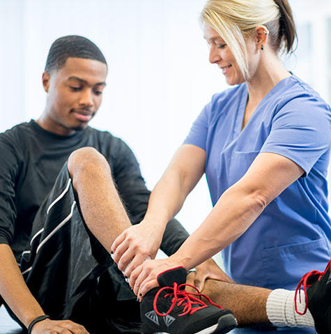 Patient at a sports medicine appointment Patient at a sports medicine appointment
