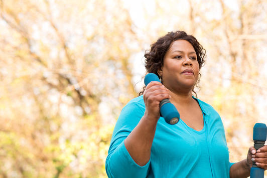 woman walking with weights
