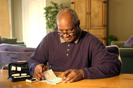 man working on diabetes plan