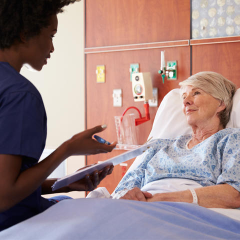 A Doctor asking a patient questions